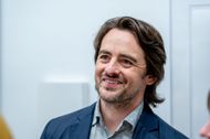 Vincent Piazza reads poetry during an Andres Serrano gallery show (Image via Getty)